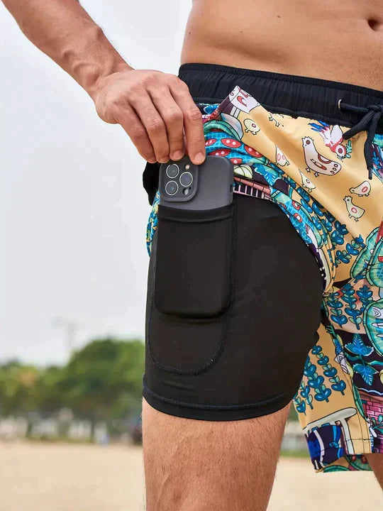 Herrarnas tryckta badshorts med dragsko för stranden