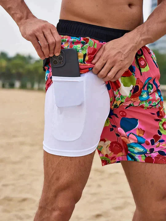 Herrarnas tryckta badshorts med dragsko för stranden