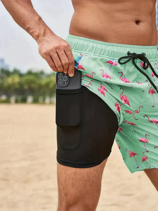Herrarnas tryckta badshorts med dragsko för stranden