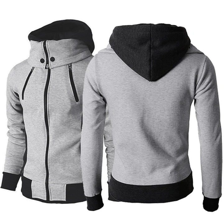 Man i smal grå sweatjacka med hög krage