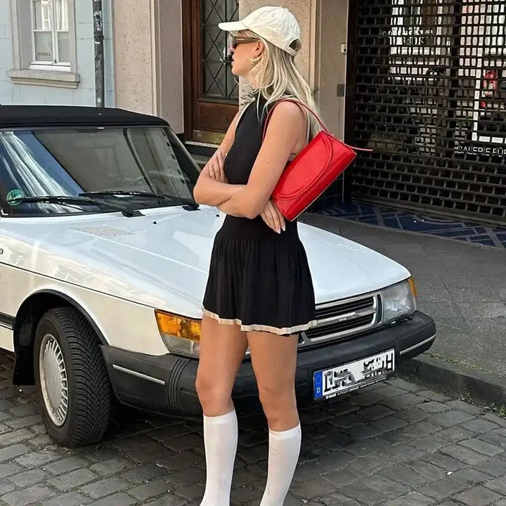 Kvinnors ärmlös stickad miniklänning med modern elegans