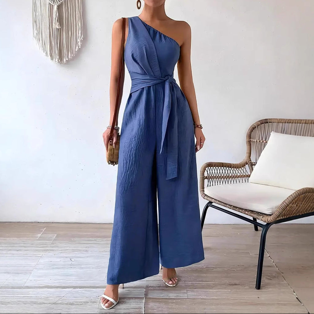 Kvinnors Enaxlad Jumpsuit med Bälte och Bred Ben Silhuett