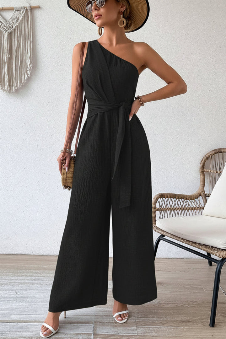 Kvinnors Enaxlad Jumpsuit med Bälte och Bred Ben Silhuett