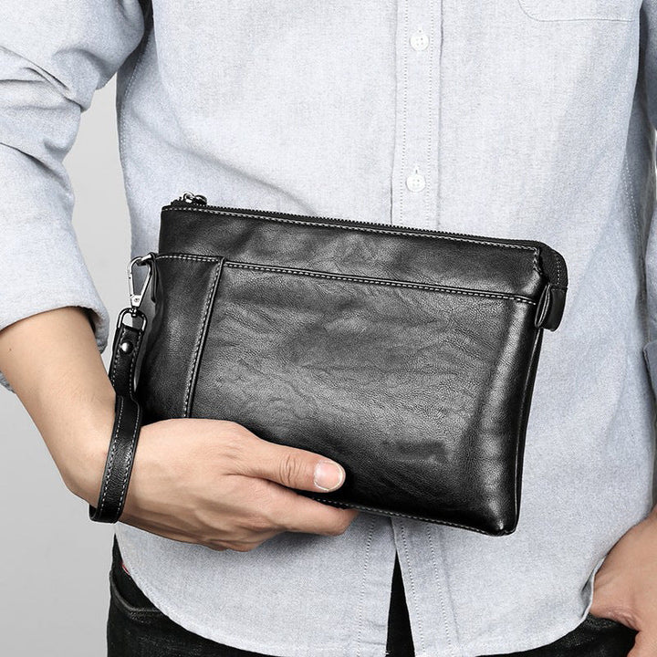 Herrars läderclutch med smidig handledsrem, vardagsorganisatör