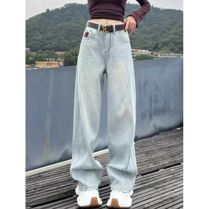 Kvinnors tvättade vida jeans med avslappnad passform