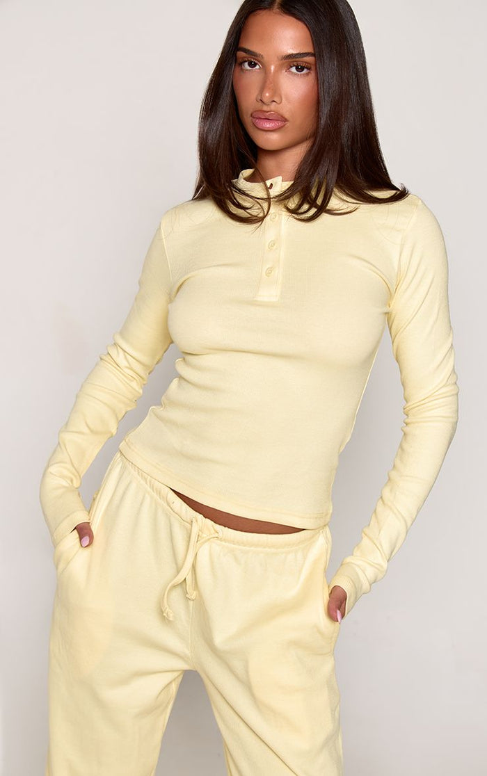 Kvinnors Ribbad Henley Lounge Set med Vida Byxor