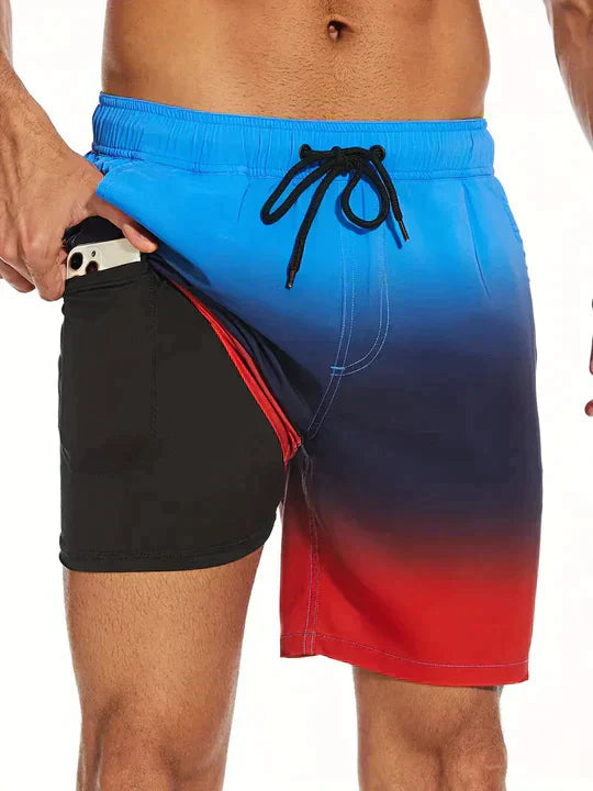 Herrarnas tryckta badshorts med dragsko för stranden