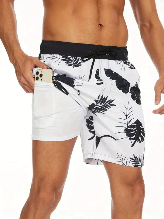 Herrarnas tryckta badshorts med dragsko för stranden