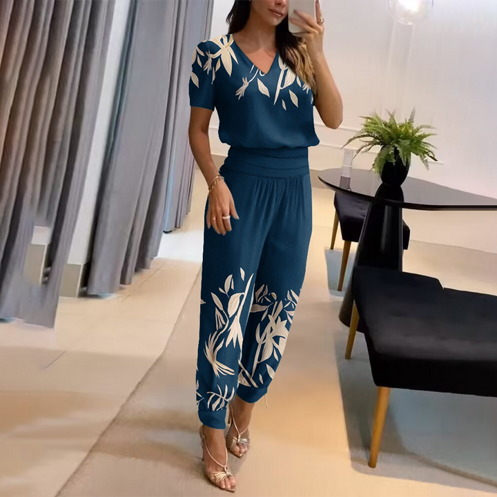 Kvinnors Tryckt Jumpsuit med V-Hals och Knytmidja, Breda Ben, Avslappnad Passform, Stilig Vardagsoutfit