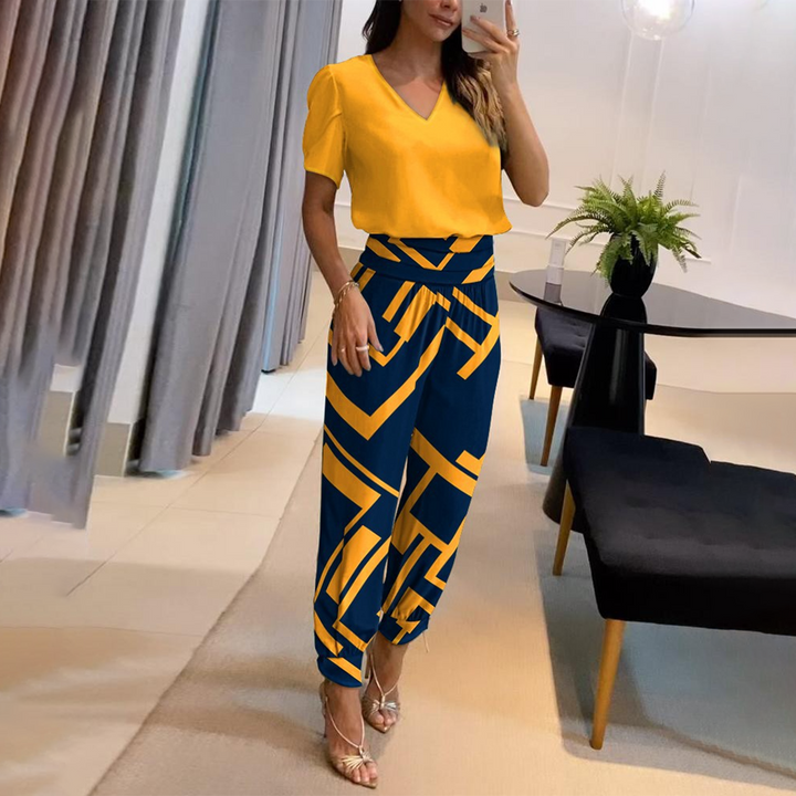 Kvinnors Tryckt Jumpsuit med V-Hals och Knytmidja, Breda Ben, Avslappnad Passform, Stilig Vardagsoutfit