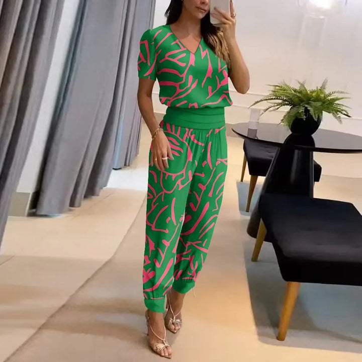 Kvinnors Tryckt Jumpsuit med V-Hals och Knytmidja, Breda Ben, Avslappnad Passform, Stilig Vardagsoutfit