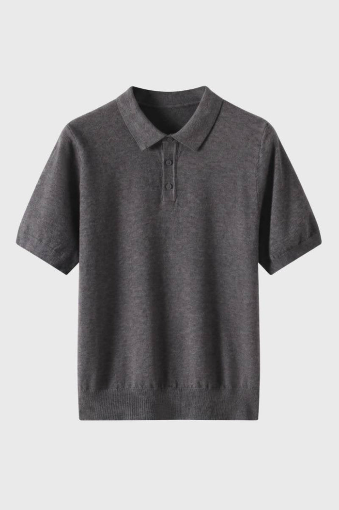 Herrstickad polo med ribbad nederkant