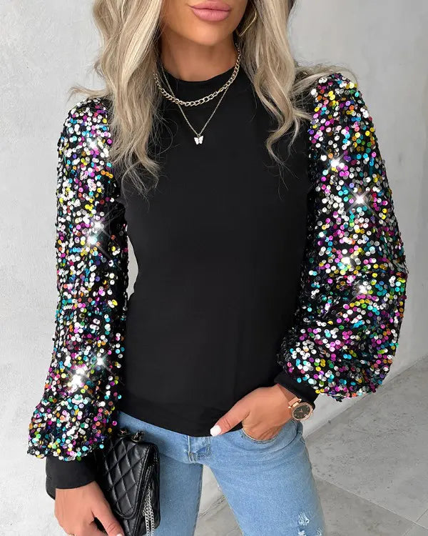 Kvinnors Färgglada Ballongärmsblus med Kontrastpaneler, Paljettdetaljer och Chic Vardagsstil